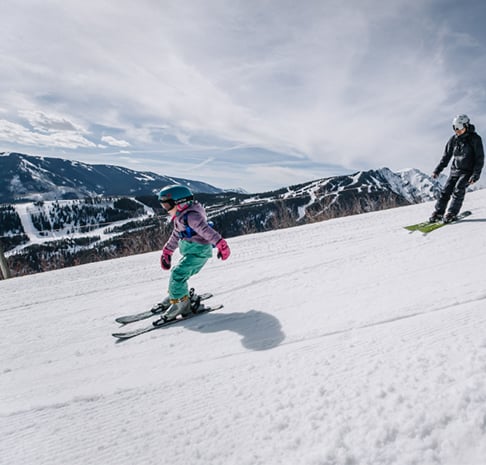 Family Skiing the Slopes